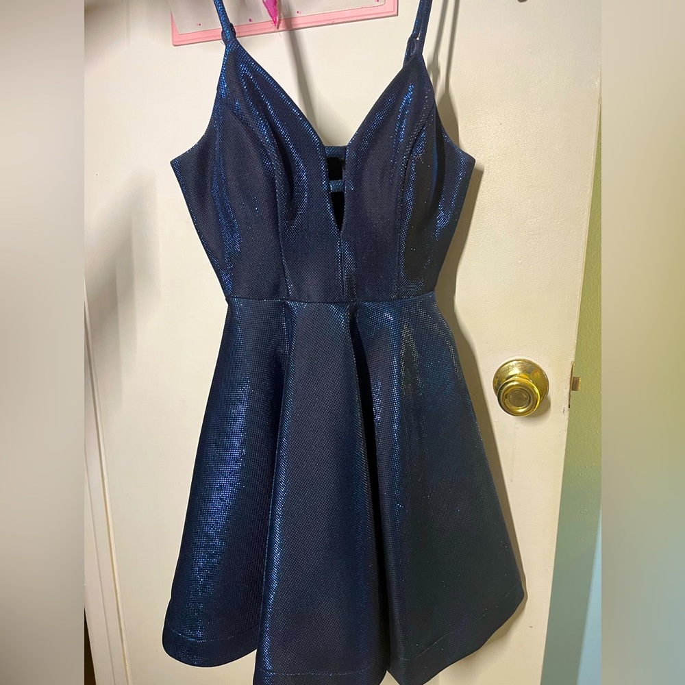 This dress is from dillards and it is a size 1 in juniors.